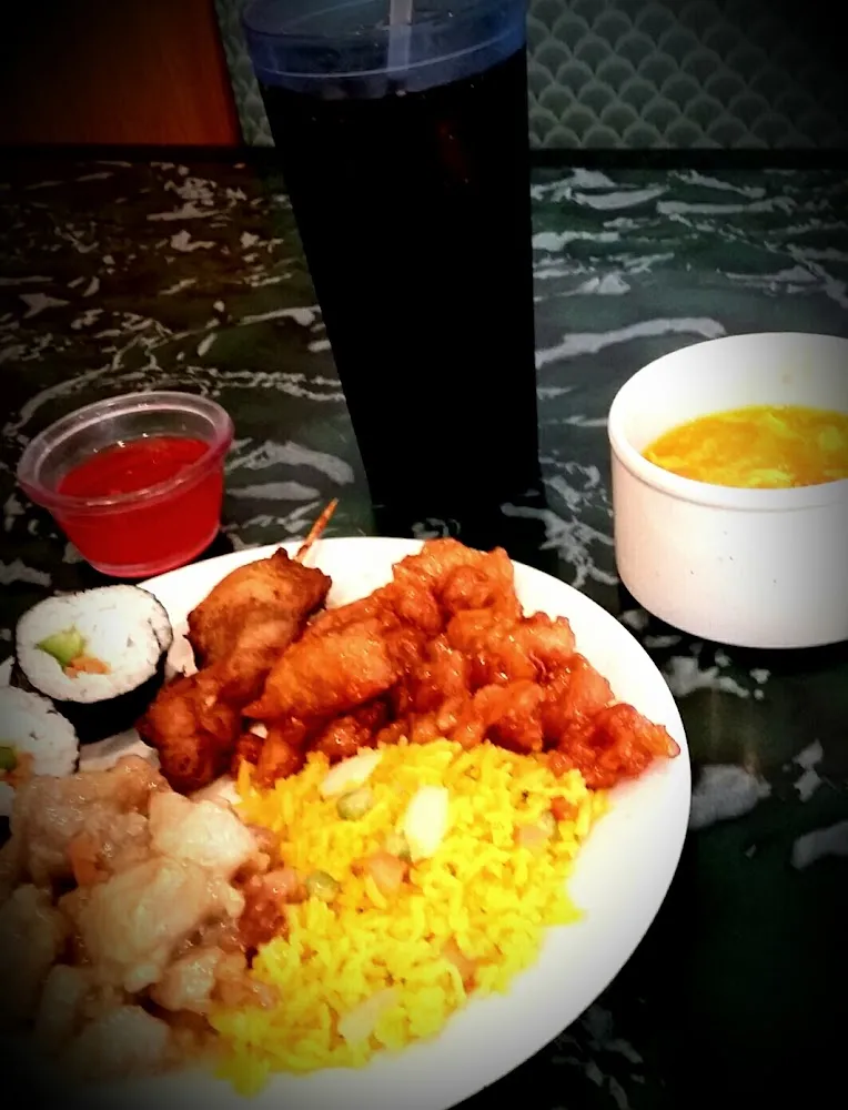 Sesame Chicken Coconut Shrimp Sushi and Egg Drop Soup